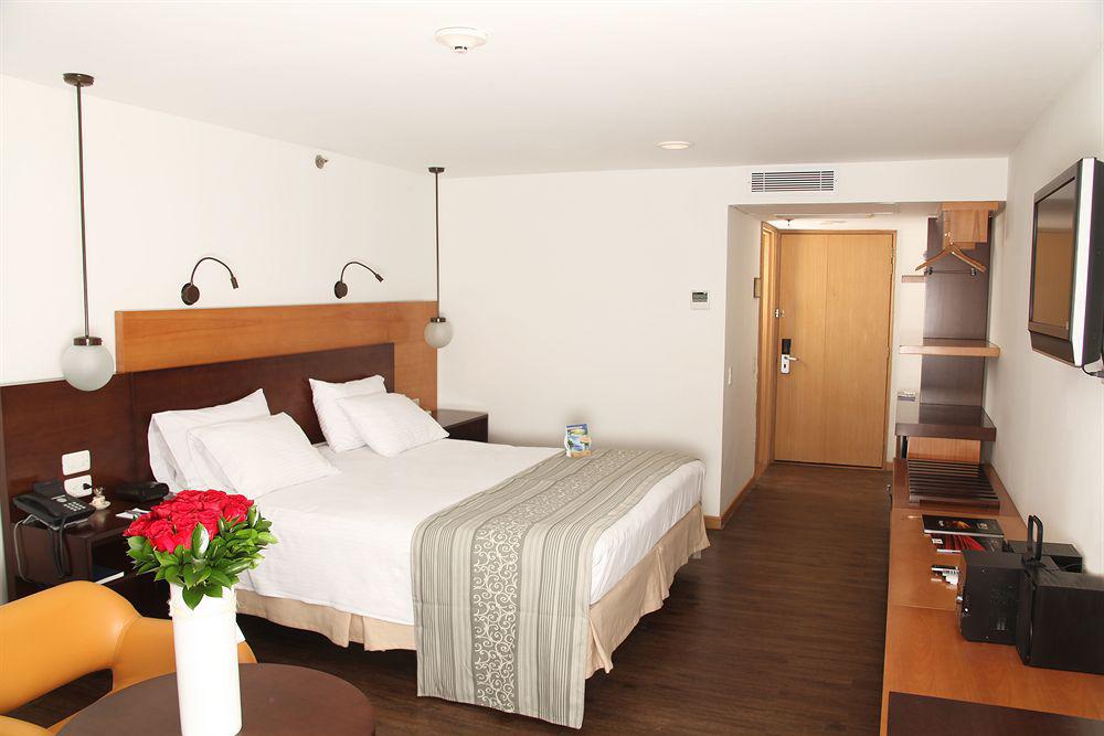Hotel Dann Norte Богота Номер фото